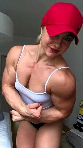 muscle girl, female bodybuilder, pec flexing, pecs