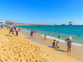 Tourists on a Beach in Cabo San Lucas, Mexico