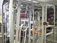 The 1943 Colossus code-breaking machine used paper tapes to hold data (replica shown)