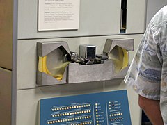 Fanfold paper tape reader on a PDP-1 minicomputer (1960s)