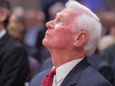 Apollo 17 mission commander Gene Cernan, the last man to walk on the moon, looks skyward during a memorial service celebrating the life of Neil Armstrong at the Washington National Cathedral, Thursday, Sept. 13, 2012.