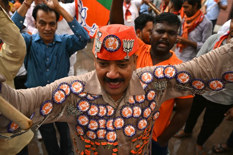 Supporters of Narendra Modi, India's Prime Minister and leader of Bharatiya Janata Party (BJP) celebrate vote counting results for India's general election