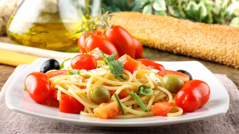 Closeup of bucatini pasta salad on a plate