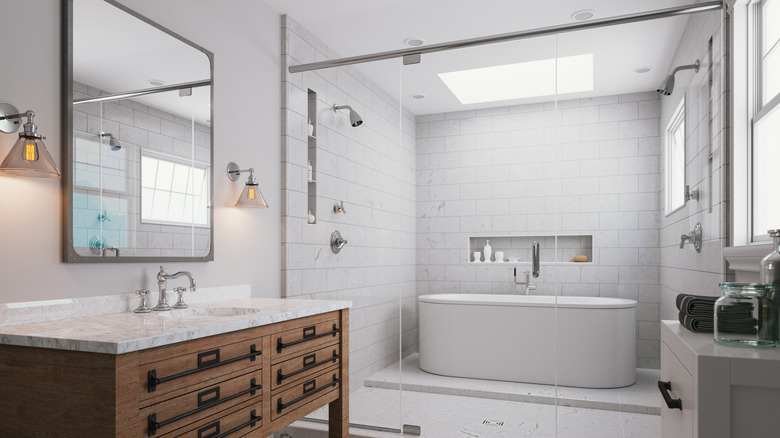 bathroom with white shower tiles