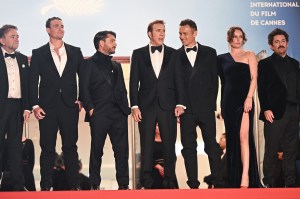 CANNES, FRANCE - MAY 17: L-R) Robert Connolly, Alexander Bertrand, Justin Rosniak, Nicolas Cage, Julian McMahon, Leonora Darby, Lorcan Finnegan and Brunella Cocchiglia attend the "The Surfer" Red Carpet at the 77th annual Cannes Film Festival at Palais des Festivals on May 17, 2024 in Cannes, France. (Photo by Stephane Cardinale - Corbis/Corbis via Getty Images)