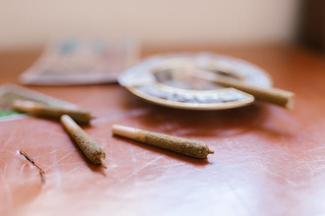 Marijuana joints on a table; image by RDNE Stock project, via Pexels.com.