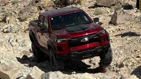 2024 Chevy Colorado ZR2 Bison tackling a rocky off-road trail.