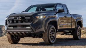 2024 Toyota Tacoma PreRunner with the XtraCab configuration posed outdoors.