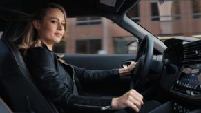 Actor Brie Larson smiles in a Nissan advertisement.