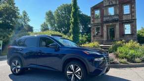 A blue 2024 Nissan Rogue crossover SUV in Louisville, Kentucky.