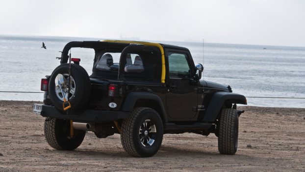 Jeep Wrangler on a beach