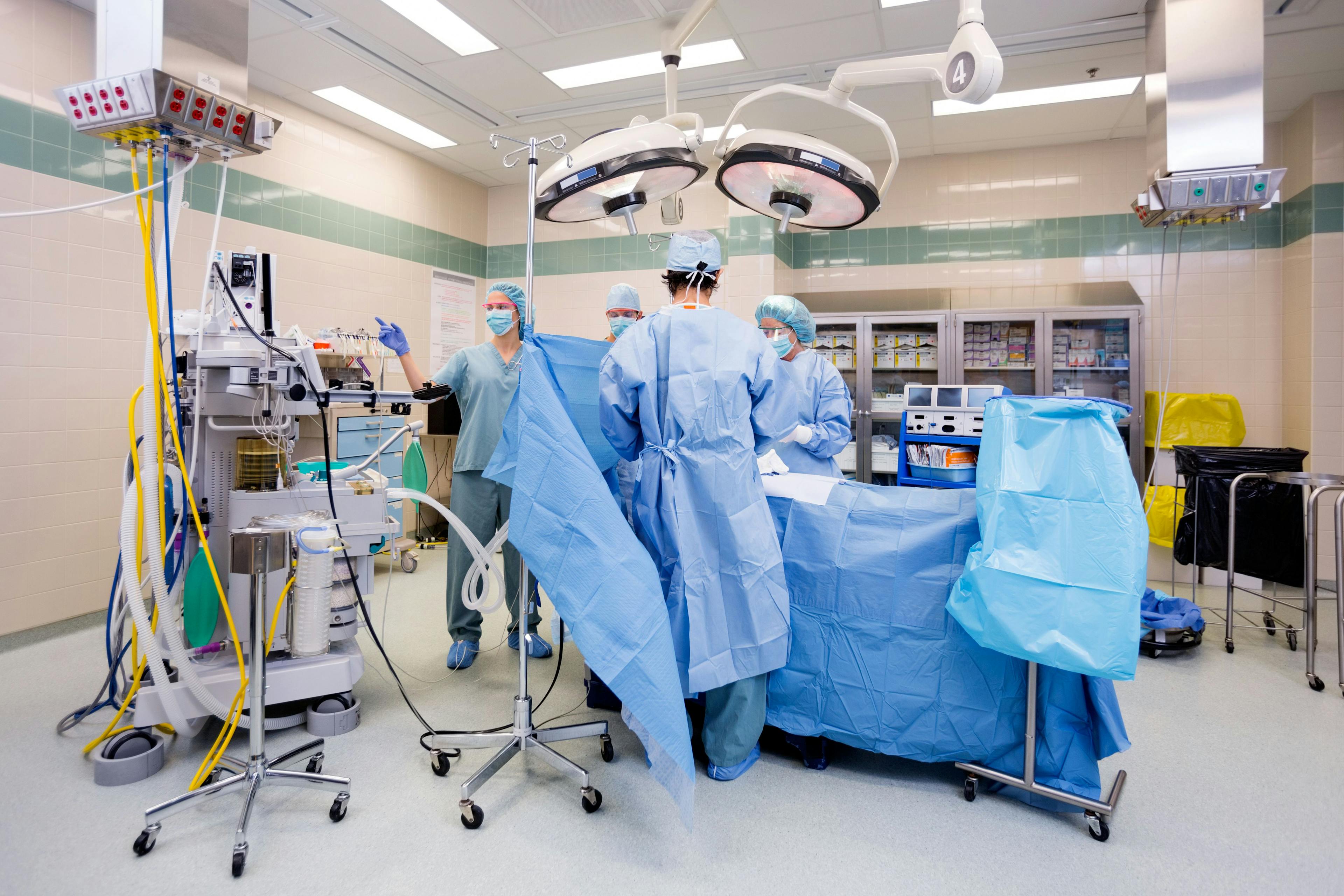 Surgical team in operating room | Image credit: ©Tyler Olsen  stock.adobe.com