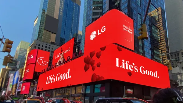 LG Electronics' global campaign "Optimism Your Feed" is showcased on digital billboards against a red background.