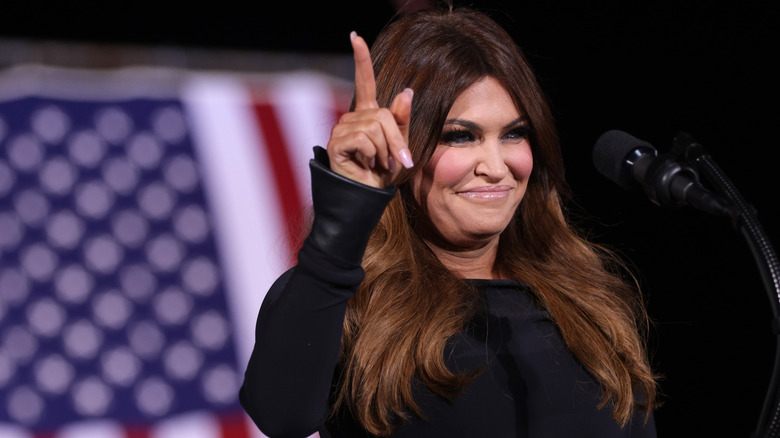 Kimberly Guilfoyle smiling pointing up