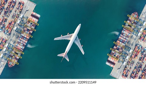 Aerial top view of Container ship loading and unloading, Cargo container in deep seaport for the international order. Transportation and travel concept. Stock Photo