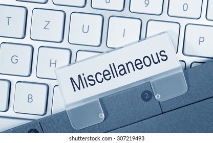 Miscellaneous - folder with text on computer keyboard in the office Stock Photo