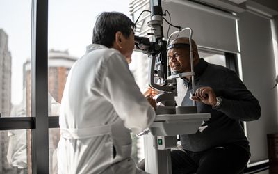 A person getting an eye exam for astigmatism