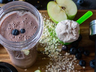 Breakfast smoothie with fresh blueberries, apples, oatmeal and whey protein powder 