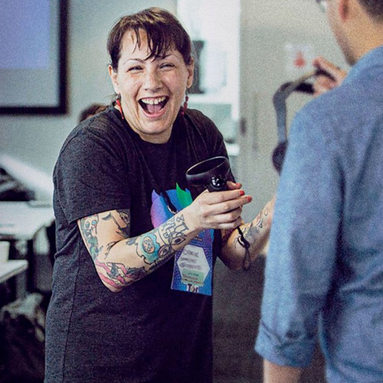 Picture of a woman looking at the camera and smiling