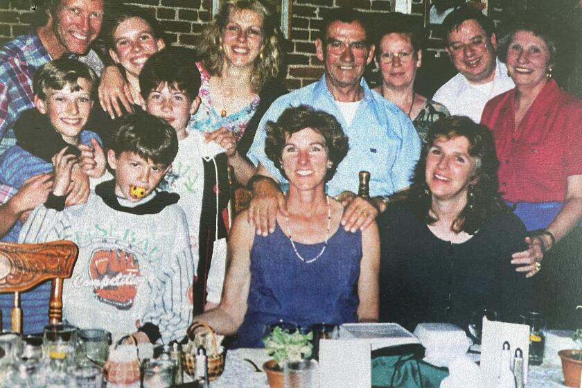 The families of Gilbert DesClos and Lt. Donald Johnson gather in the 1990s.