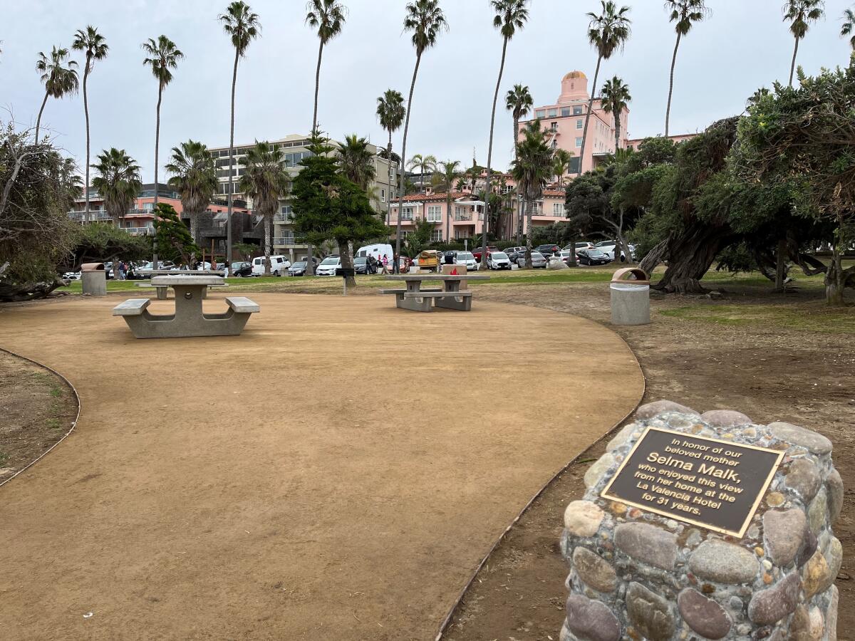 A picnic grove in La Jolla's Scripps Park contains a memorial plaque for Selma Malk.