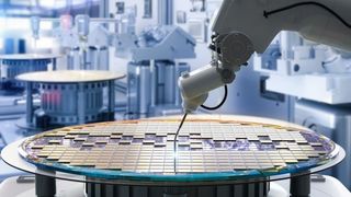 robotic arm assembles chips