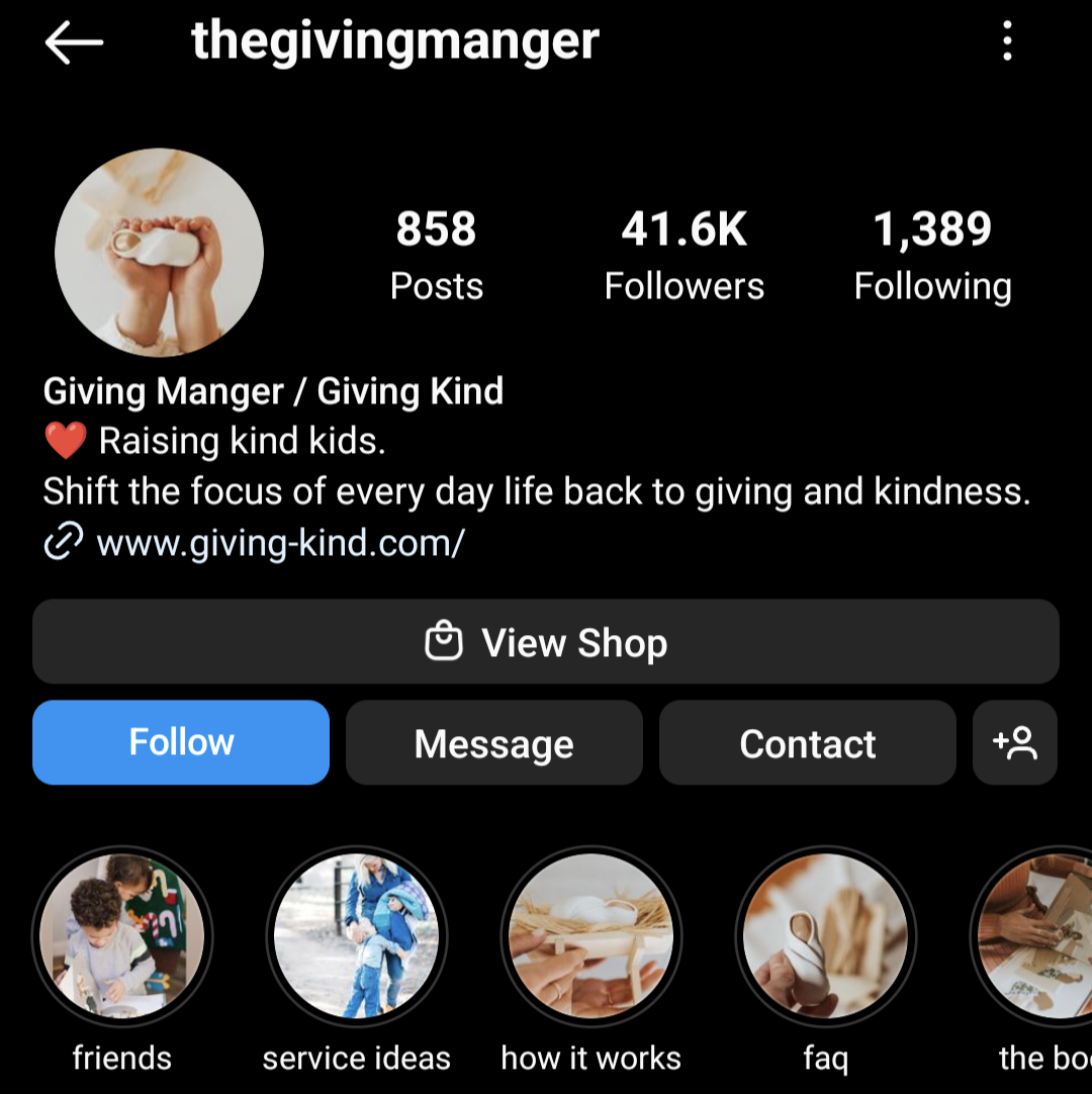 The Giving Manger uses simple emojis and website url in its Instagram bio