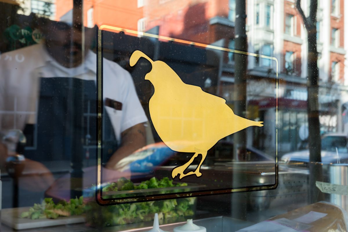 A window with a quail decal.