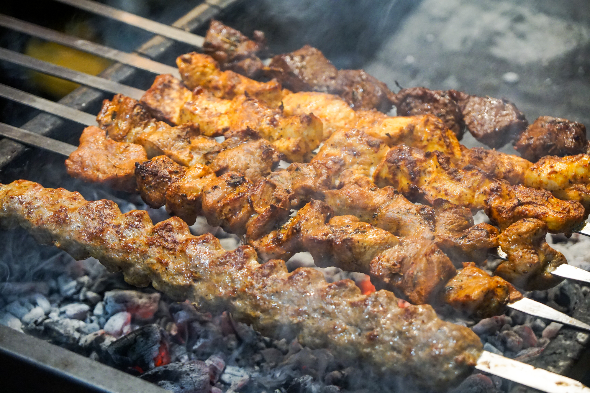 Grilled Armenian meat skewers over live fire.