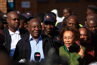 FILE PHOTO: South African president Cyril Ramaphosa votes in Soweto