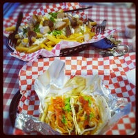 Photo taken at Pork Belly Grub Shack by Ian T. on 9/12/2012