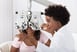 optometrist testing patients vision