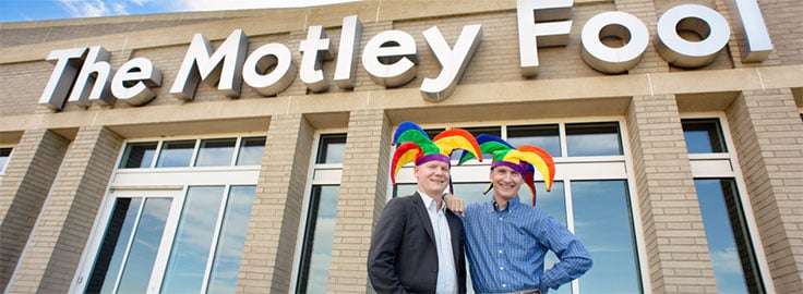 Founders Tom and David Gardner standing outside The Motley Fool's global headquarters.