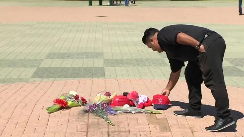 FILE - A makeshift memorial forms outside of Angel Stadium of Anaheim for pitcher Tyler Skaggs...