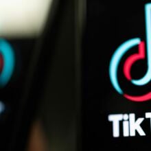  In this photo illustration, a TikTok logo is displayed on an iPhone in London, England.