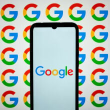 google logo on phon with google logo background