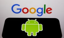A phone displays the Android logo in front of the Google homepage.