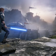 Screen grab from gameplay of "Star Wars Jedi: Fallen Order" video game featuring main character holding lightsaber looking at scenic view