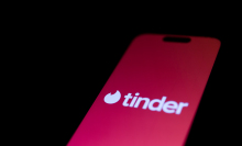 tinder logo on phone