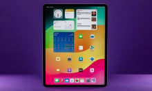 iPad Air in portrait mode against a purple background