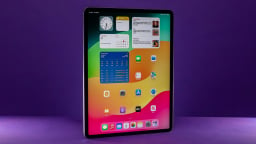 iPad Air slightly tilted in portrait mode against purple background
