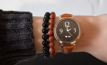 Garmin Lily 2 watch on wrist with bracelets