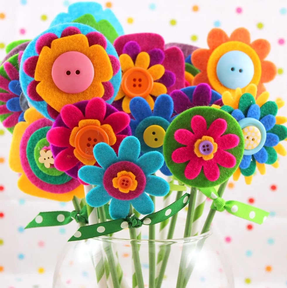 a bouquet of felt flowers sits in a clear vase the project is a good housekeeping pick for best activities for kids