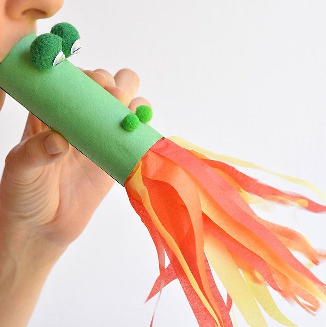 a cardboard toilet paper tube turned into a fire breathing dragon craft