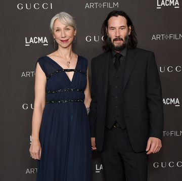 keanu reeves holds hands with alexandra grant on the red carpet at the 2019 lacma art film gala honoring betye saar and alfonso cuaron presented by gucci red carpet