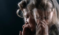 a double exposure photograph of a woman apparently suffering from anxiety