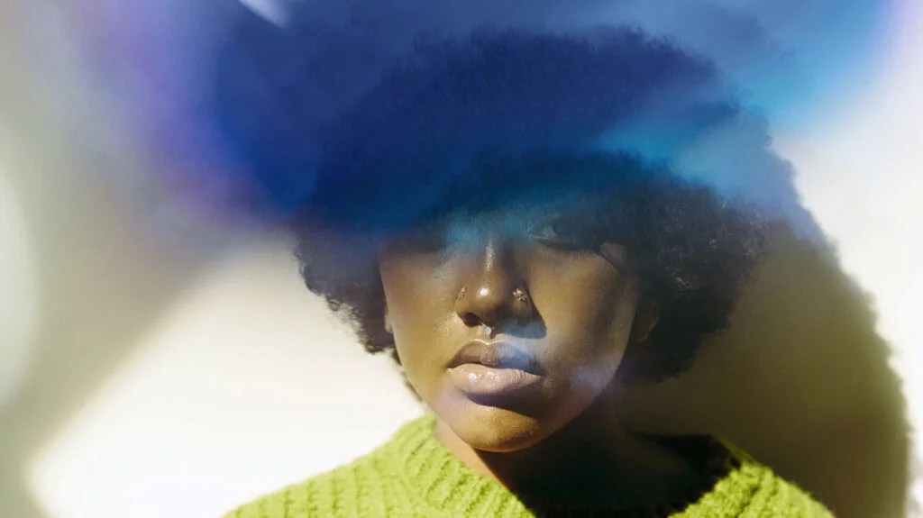 Prismatic Images Of A Black Woman depicting mental health