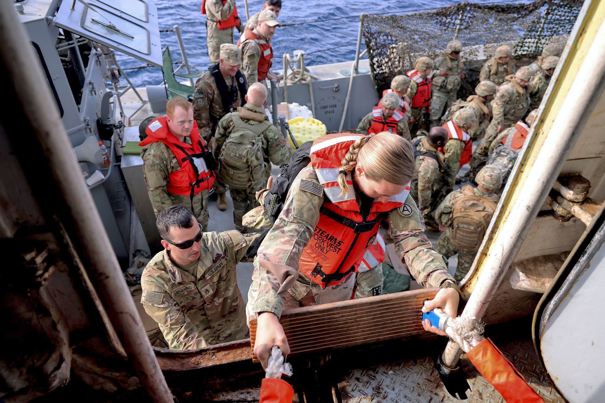British army personnel wearing life jackets aboard RFA Cardigan Bay