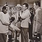 Louis Armstrong, Larry Gates, Kurt Kasznar, John McIntire, Ralph Meeker, and Gilbert Roland in Glory Alley (1952)