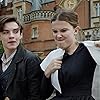 Millie Bobby Brown and Louis Partridge in Enola Holmes (2020)